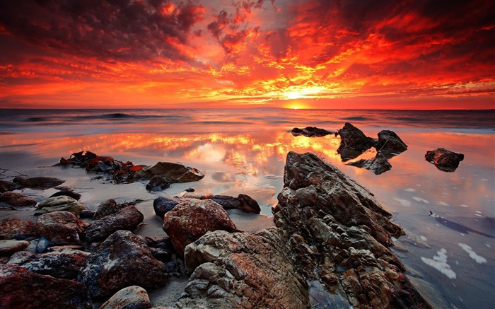 Tonos de la puesta de sol mezclando playa húmeda-naturaleza fotografía fondo Vistas:8934