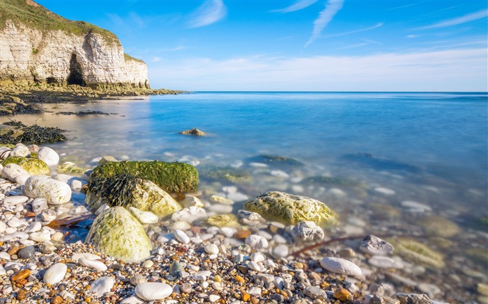 Island coast beach rock algae blue sky Views:7825 Date:2018/11/9 9:41:59